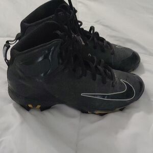 Nike Black and Gold Athletic Cleats